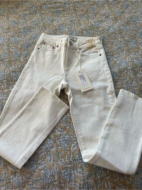 High-Rise Skinny Jeans in Off-White by Frame